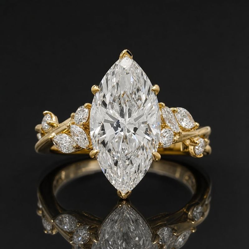 Marquise ring shown from the front with branching shoulders