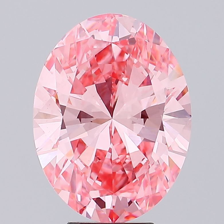 Pink oval diamond photographed face-up