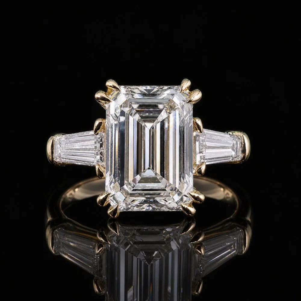 Emerald-cut diamond ring with tapered side stones